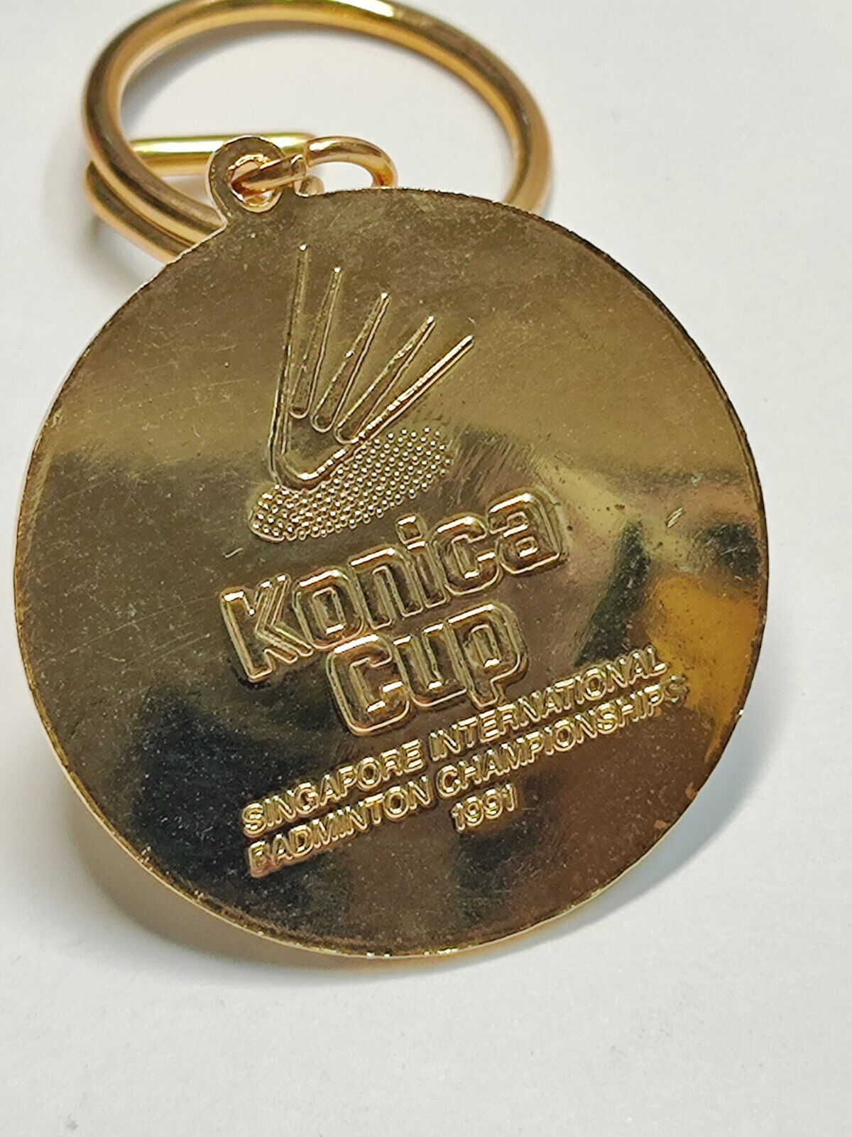 AMM68 VINTAGE KEYCHAIN KEYRING SG KONICA CUP BADMINTON CHAMPIONSHIP 1991 (JF078)